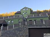 Výjimečná vila v Praze-Lysolajích: 4 bytové jednotky, wellness, bazén, 3 garáže a vinárna, cena cena v RK, nabízí 